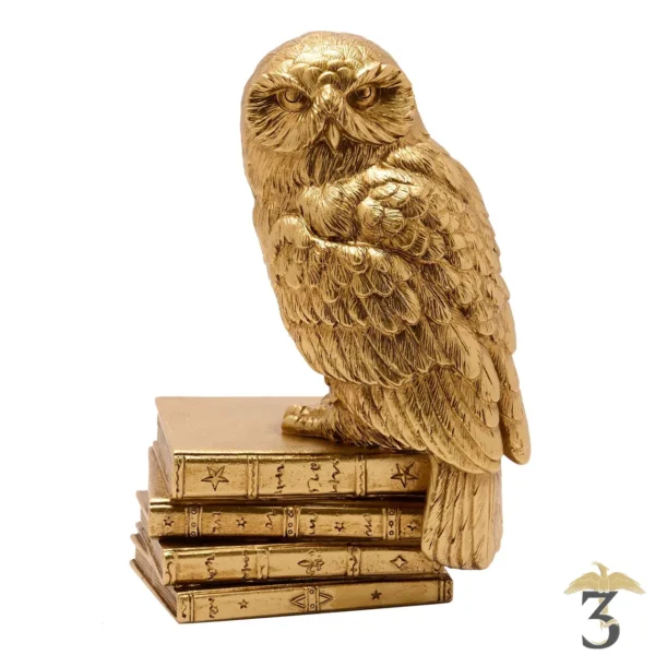 Statuette hedwige dorée - Les Trois Reliques, magasin Harry Potter - Photo N°1